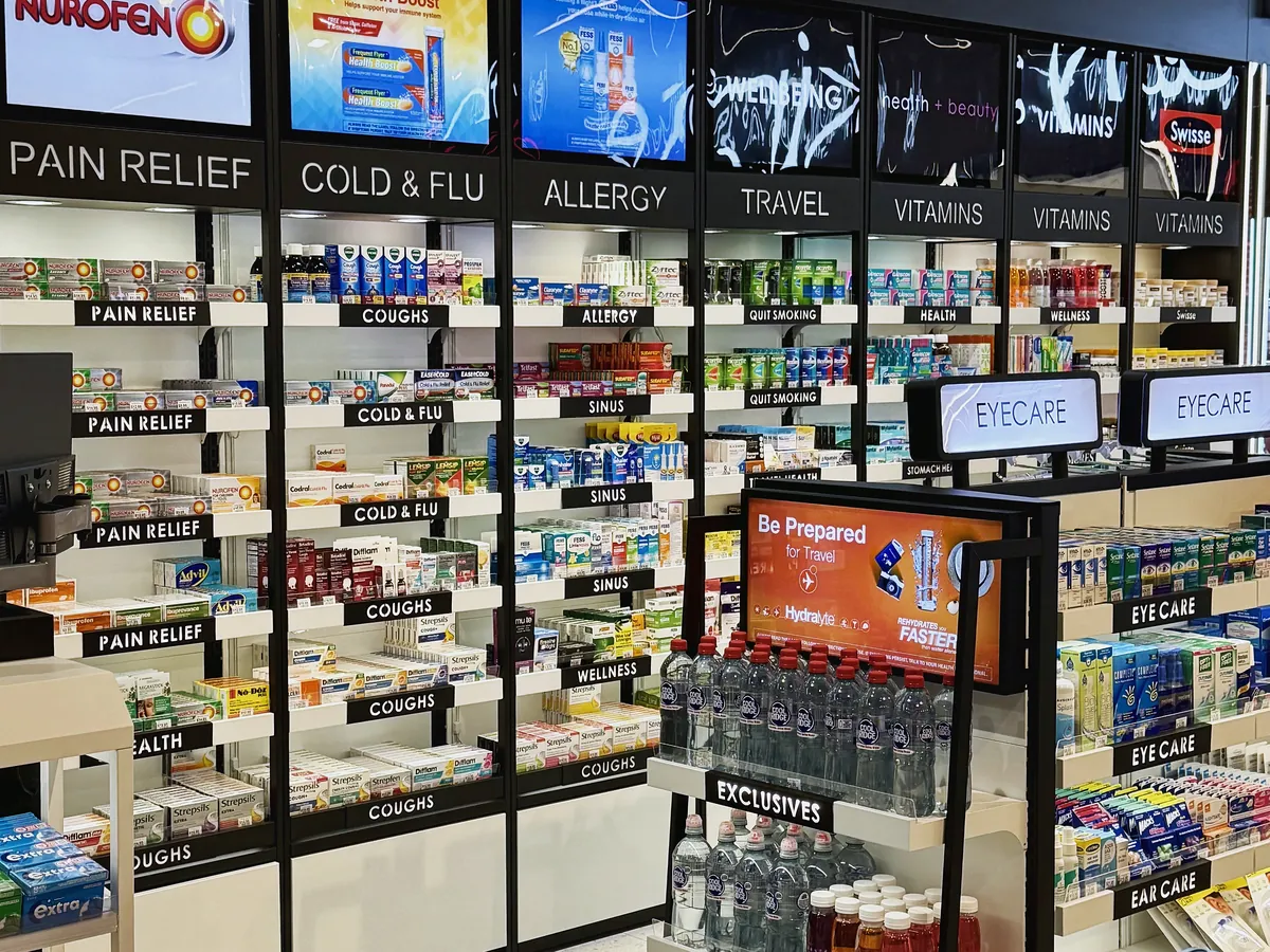 Health wall with pain relief, cold and flu and vitamins at health + beauty Melbourne T3